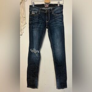 Women’s Dark Indigo Distressed Skinny Jeans